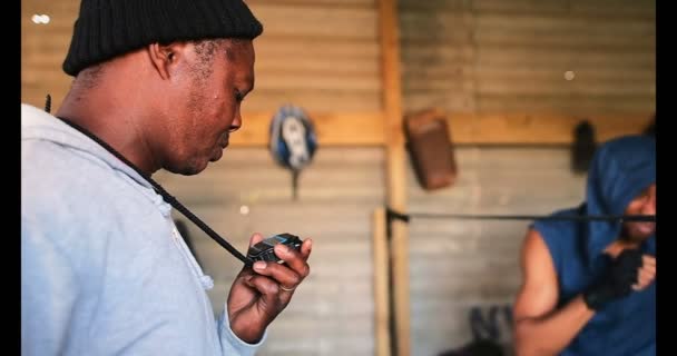 Front View Young African American Male Boxer Practicing Boxing Trainer — Stock Video