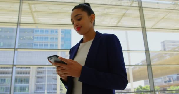 Low Angle View Beautiful Mixed Race Businesswoman Using Her Mobile — Stock Video