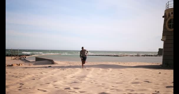 Front View Young African American Male Runner Jogging Camera Beach — Stock Video