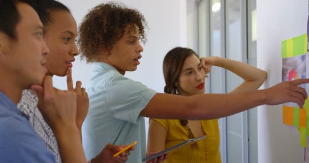 Side View Multi Ethnic Business Colleagues Discussing Graphs Sticky Notes — Stock Video