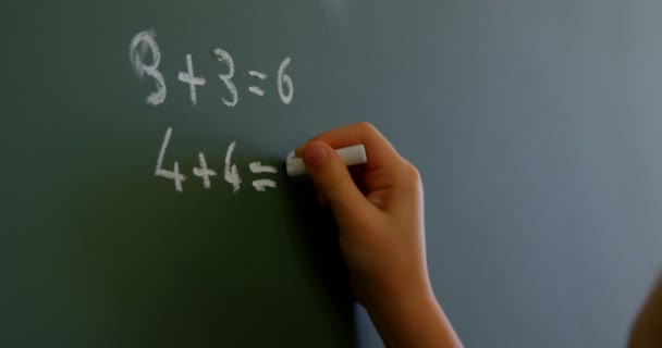 Close Schoolgirl Writing Chalkboard Chalk Classroom School She Solving Mathematical — Stock Video