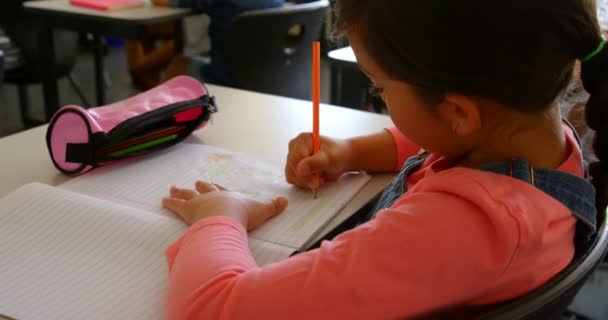 Side View Caucasian Schoolgirl Studying Desk Classroom School She Writing — Stock Video