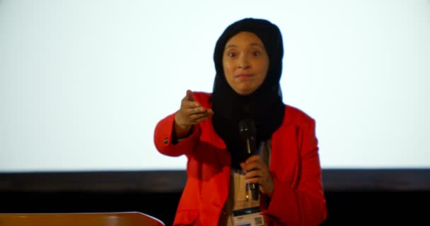 Front View Beautiful Mature Caucasian Hijab Businesswoman Speaking Podium Auditorium — Stock Video