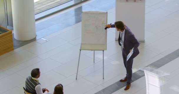 High Angle View Caucasian Male Speaker Standing Clipboard Speaking Public — Stock Video