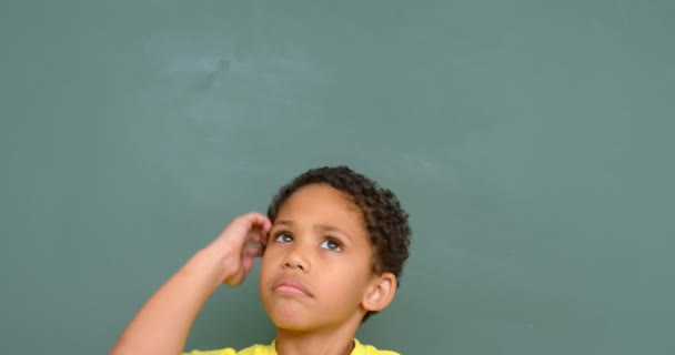 Front View Thoughtful African American Schoolboy Standing Chalkboard Classroom Looking — Wideo stockowe