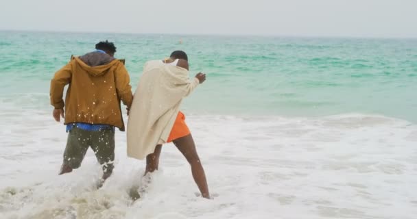 Rear View African American Couple Playing Sea Waves Beach Having — Stock Video