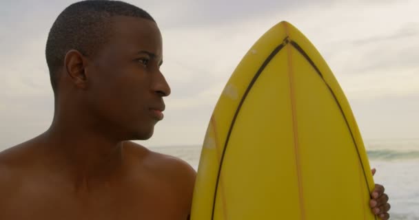Front View African American Male Surfer Standing Surfboard Beach Looking — Stock Video