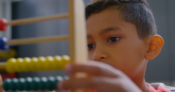 Front View Asian Schoolboy Solving Math Problem Abacus Desk Classroom — Video