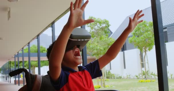 Front View Disabled African American Schoolboy Using Virtual Reality Headset — Video