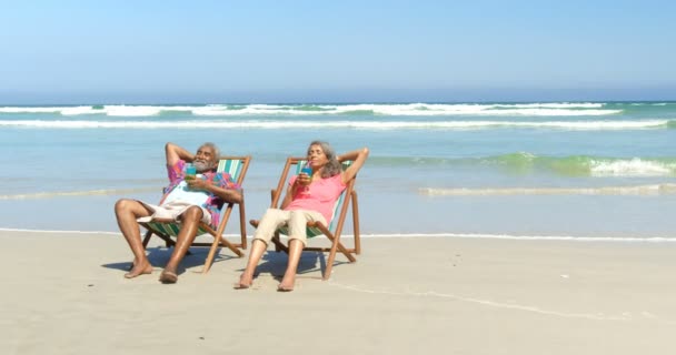 Front View Active Senior African American Couple Having Drinks Deckchair — Stock Video