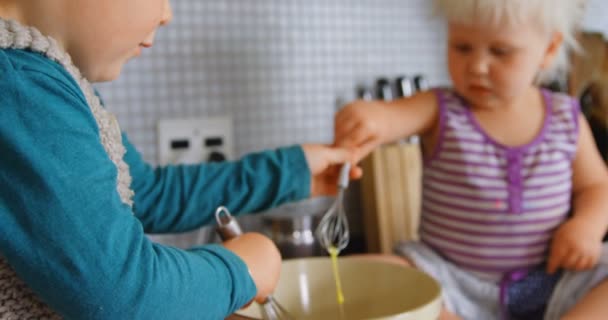 Close Caucasian Siblings Stirring Eggs Whisker Kitchen Home Preparing Food — Stock Video