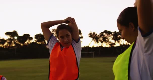 Front View Diverse Female Soccer Players Stretching Arms Soccer Field — Stock Video