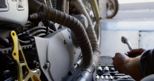 Close Caucasian Male Mechanic Repairing Motorbike Repair Garage Using Spanner — Stock Video