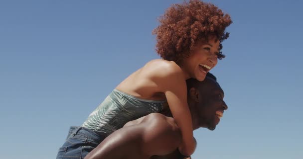 Low Angle View Young African American Shirtless Man Giving Piggyback — Stock Video