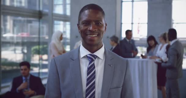 Front View African American Businessman Looking Camera Lobby Office Smiling — Stock Video