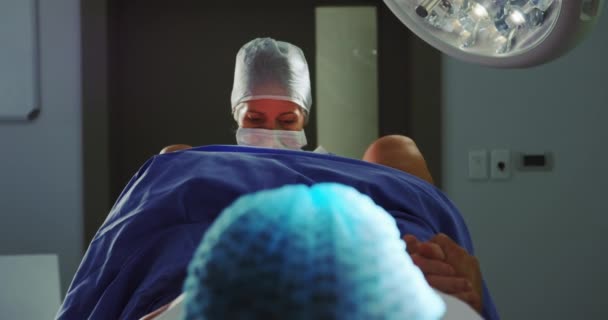 Front View Caucasian Female Surgeon Examining Pregnant Woman Delivery Operation — Stock Video