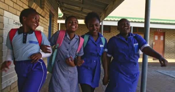 Front View Close Four Young African Schoolgirls Running School Yard — Stock Video