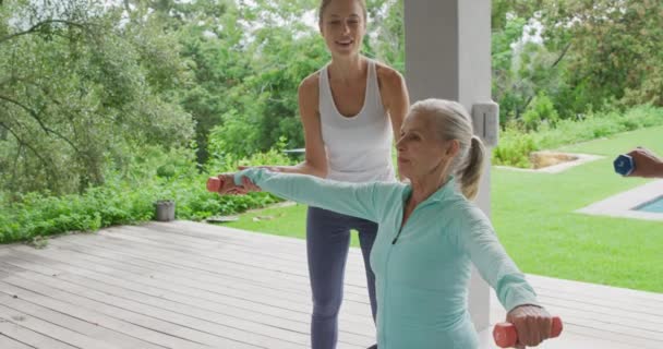 Front View Side Senior Caucasian Woman Exercising Dumbbells Garden Young — Stock Video