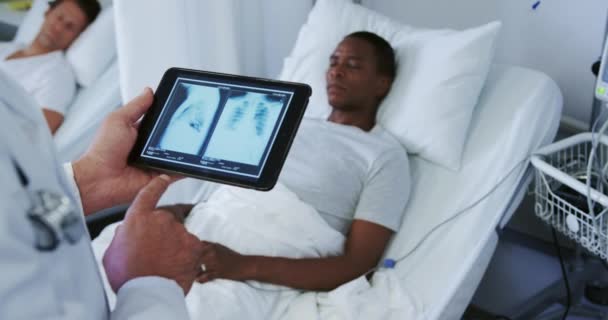 Close Caucasian Male Doctor Looking Ray Report Digital Tablet Ward — Stock Video