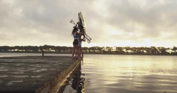 Side View Team Four Young Adult Caucasian Female Rowers Carrying — Stock Video