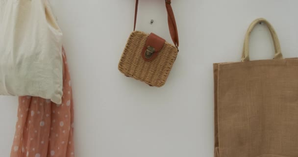 Sun Hats Handbags Hanging Wall — Stock Video