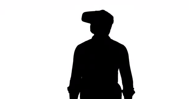 Front View Man Looking Wearing Headset Black Silhouette White Background — Stock Video