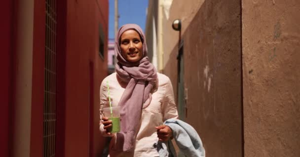 Front View Young Mixed Race Woman Wearing Hijab Walking City — Stock Video