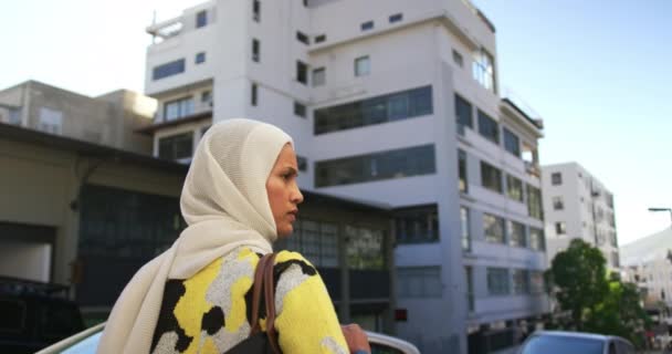 Rear View Young Mixed Race Woman Wearing Hijab Walking City — Stock Video