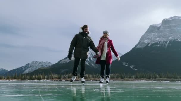 Front View Happy Millennial Caucasian Couple Ice Skating Frozen Lake — Stock Video