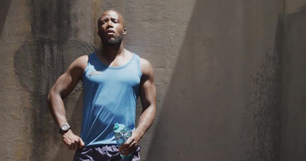 Front View Athletic African American Man Sportswear Taking Break Standing — Stock Video