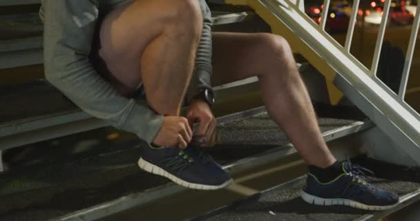 Caucasian Man Wearing Sportswear Exercising City Streets Night Sitting Stairs — Stock Video