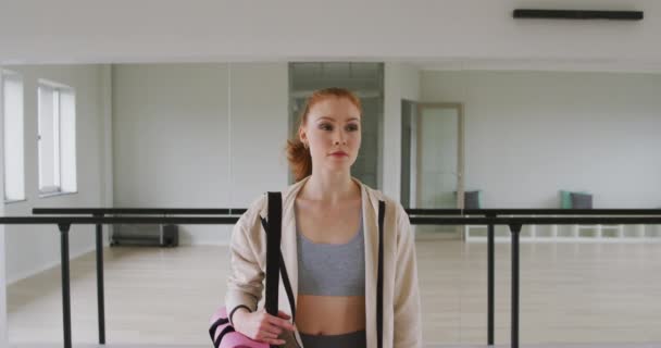 Portrait Caucasian Female Ballet Dancer Wearing Sportswear Entering Bright Studio — Stock Video