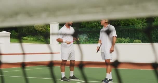 Caucasian Mixed Race Men Wearing Tennis Whites Spending Time Court — Stock Video