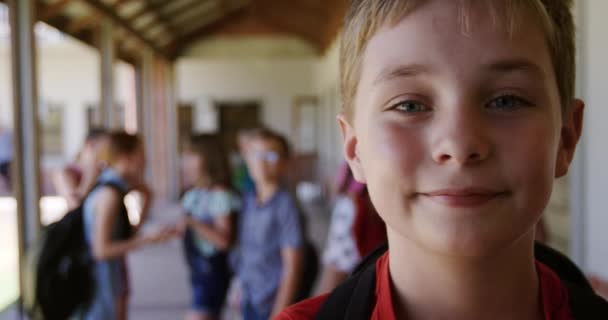 Portrait Caucasian Boy Standing Outdoor Corridor Break Looking Camera Smiling — Stock Video