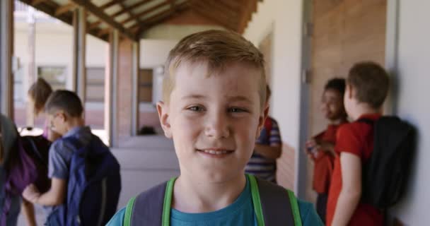 Portrait Caucasian Boy Standing Outdoor Corridor Break Looking Camera Smiling — Stock Video