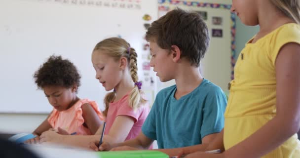 Portrait Caucasian Boy Sitting Classroom Lesson Looking Camera Smiling His — Stock Video