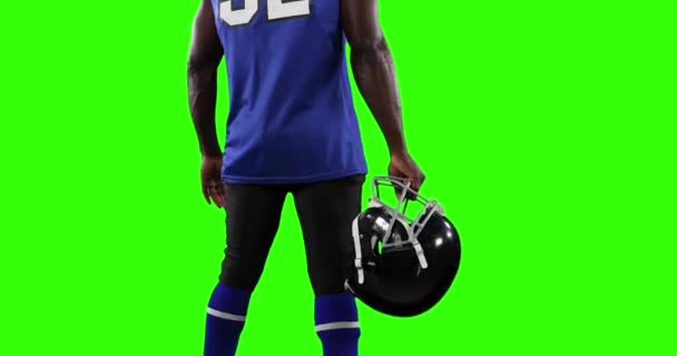 스포츠 스크린 배경에 헬멧을 아프리카계 미국인 선수의 부분을 왼쪽에서 수있다 — 비디오