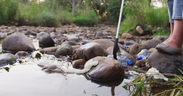 Low Section Female Caucasian Conservation Volunteer Cleaning River Sunny Day — Stock Video