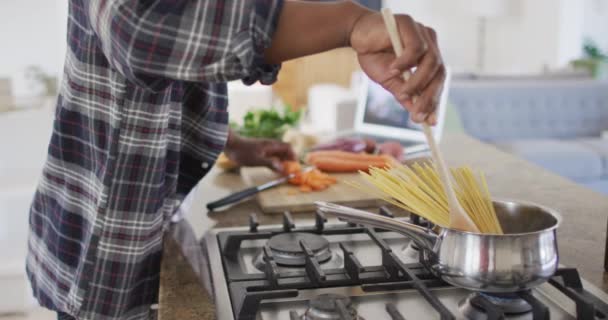 African American Senior Man Standing Kitchen Cooking Pasta Social Distancing — Stock Video