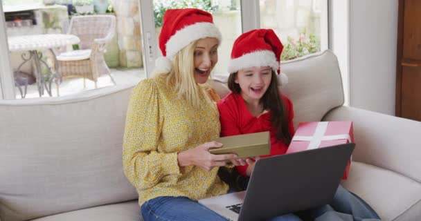 Caucasian Woman Spending Christmas Home Her Daughter Together Wearing Santa — Stock Video