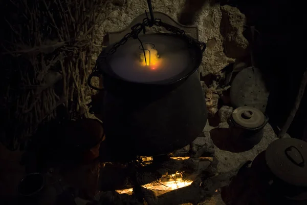 Magic cauldron with witchcraft smoke, special effects