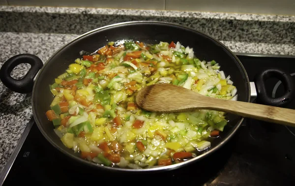 Vegetables frying in pan, vegetarian food