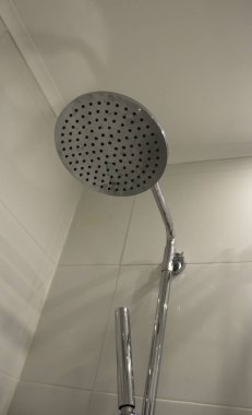 Shower head with rain effect in hotel, interior decoration
