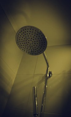 Shower head with rain effect in hotel, interior decoration