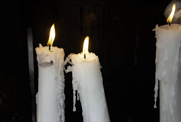 Candles lit lourdes — Stock Photo, Image