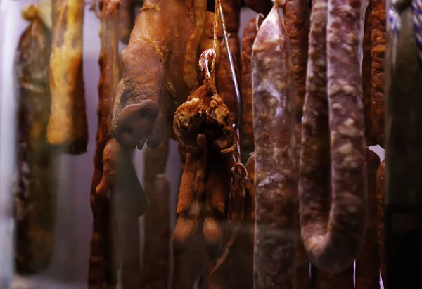 Cured sausage hung — Stock Photo, Image