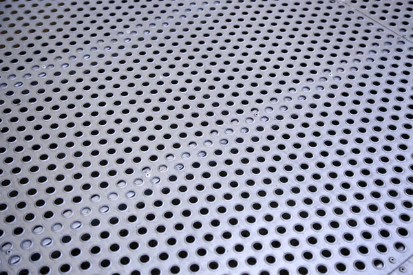 Industrial floor of metal, silver and aluminum, factory texture