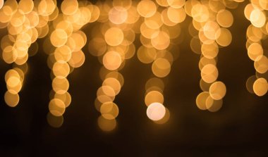 Altın glitter bokeh efekti ve seçici odak. Parlak altın ışık, altın balon Festival arka plan
