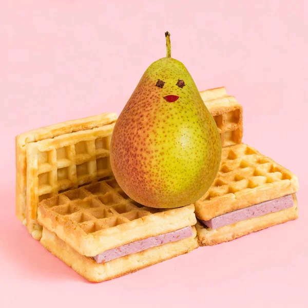 Wafers with blueberry souffle in form of sofa and pear. Minimalist style. Creative idea, imagination and fantasy. Attraction of attention to the problems of physical inactivity and abuse of sweet