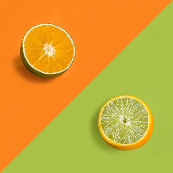 Orange in lime peel on orange background and lime in orange peel on green background. Half of fruit with juicy pulp. Photo manipulation, color game. Creative idea, imagination and fantasy. Minimalism